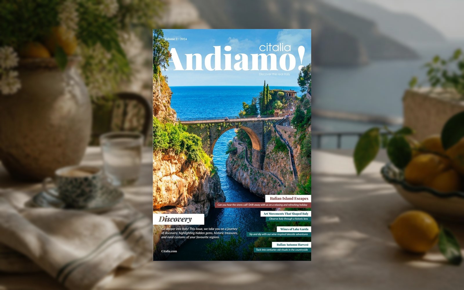 The front cover of Andiamo!, Citalia's customer magazine, on a sunlit Amalfi Coast terrace table